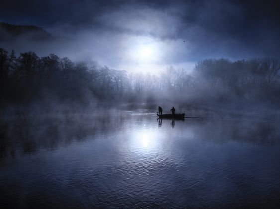 Small boat down the Adda river